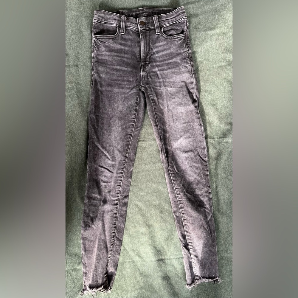 American Eagle super stretch black jeans frayed ankle size 0